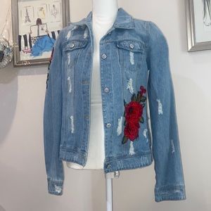 Jean jacket with flower detailing
